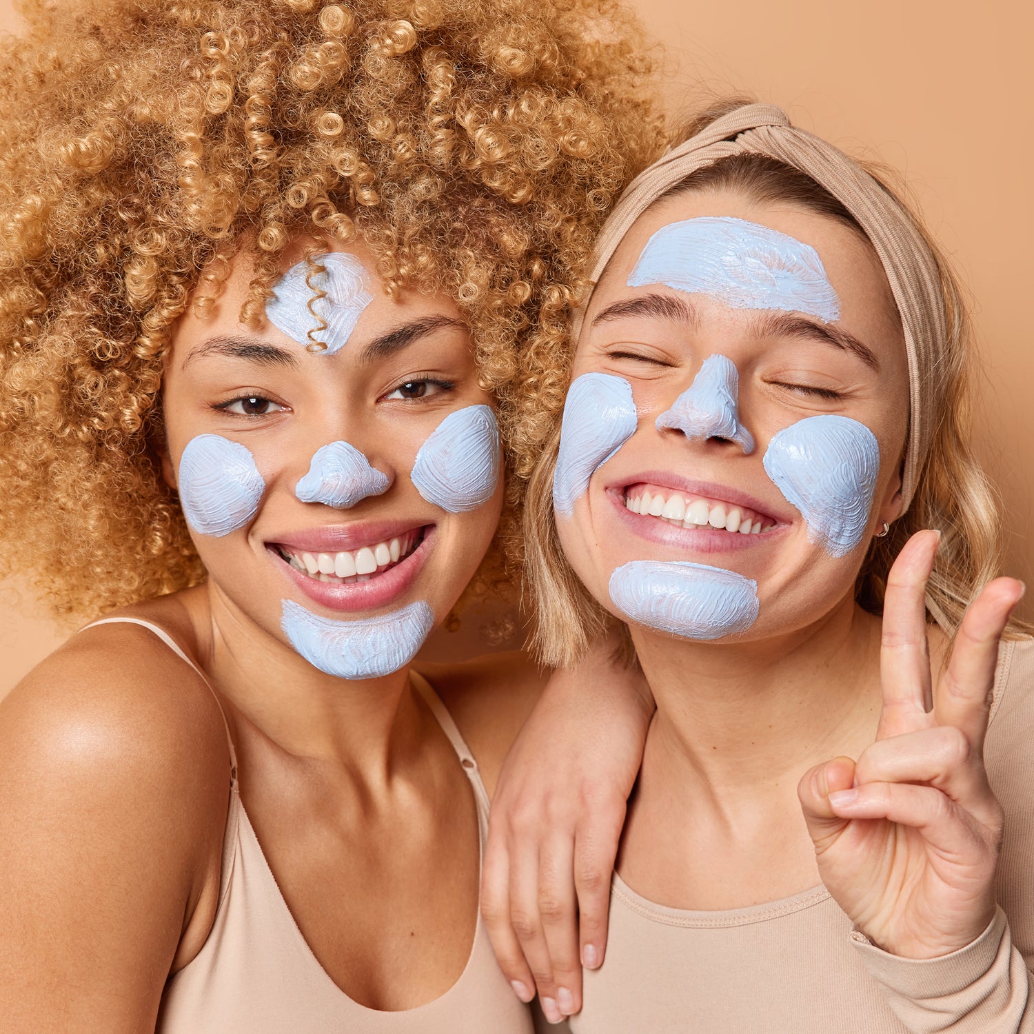Women with clay face mask for Healthy Skin and natural detox.